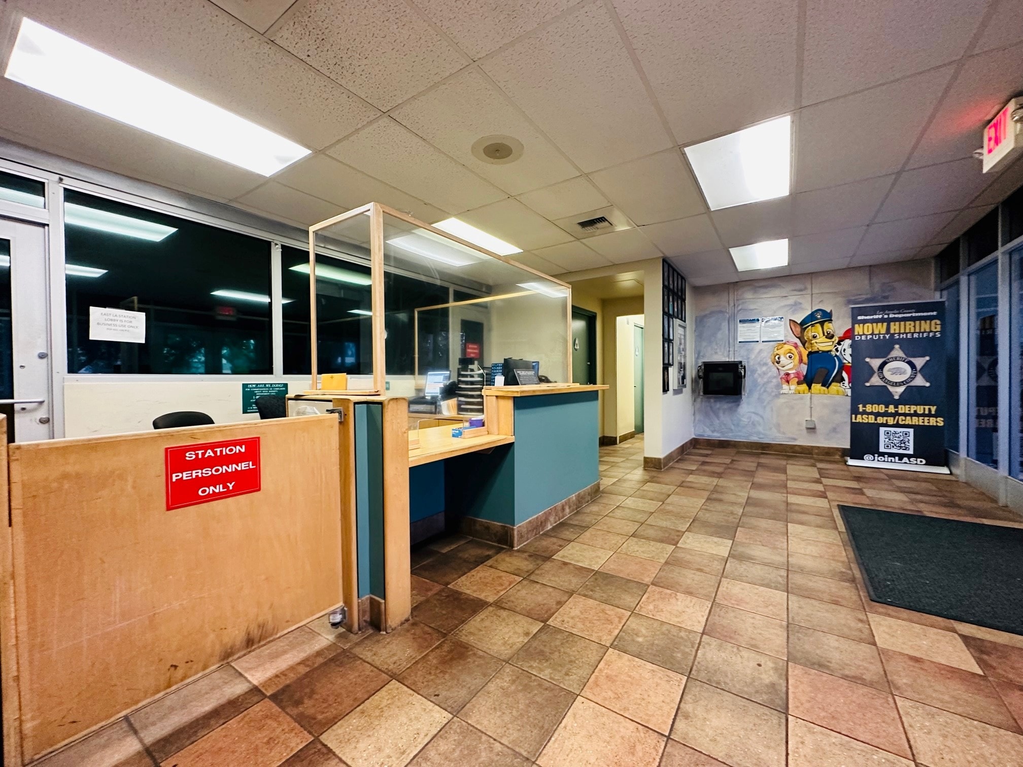 Inside the East Los Angeles Sheriff's Station lobby — the front desk where families check in during the bail process.