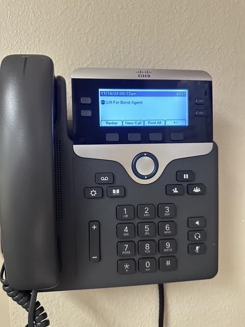 Courthouse telephone displaying Lift for Bond Agent