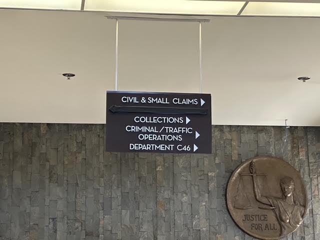 Central Justice Center directory showing Criminal and Traffic Operations Department C46